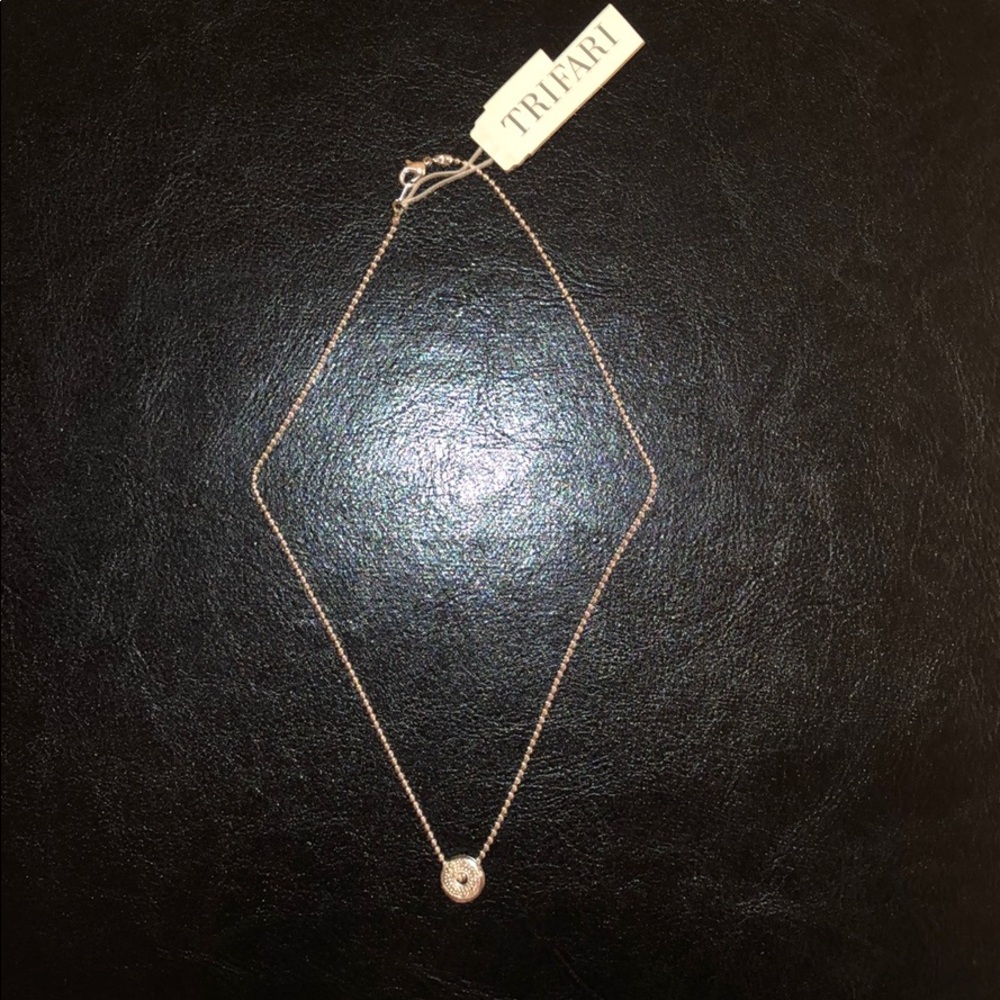 Silver necklace with donut pendant